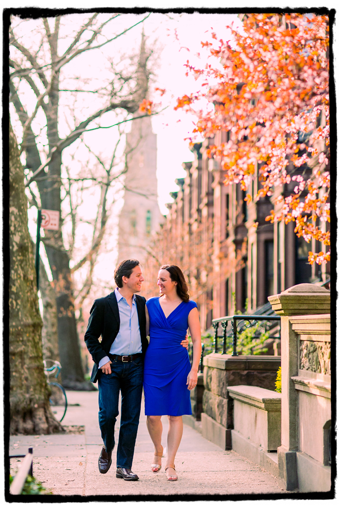 Engagement Portraits: Laura & Axuve walk along a treelined street in Park Slope.