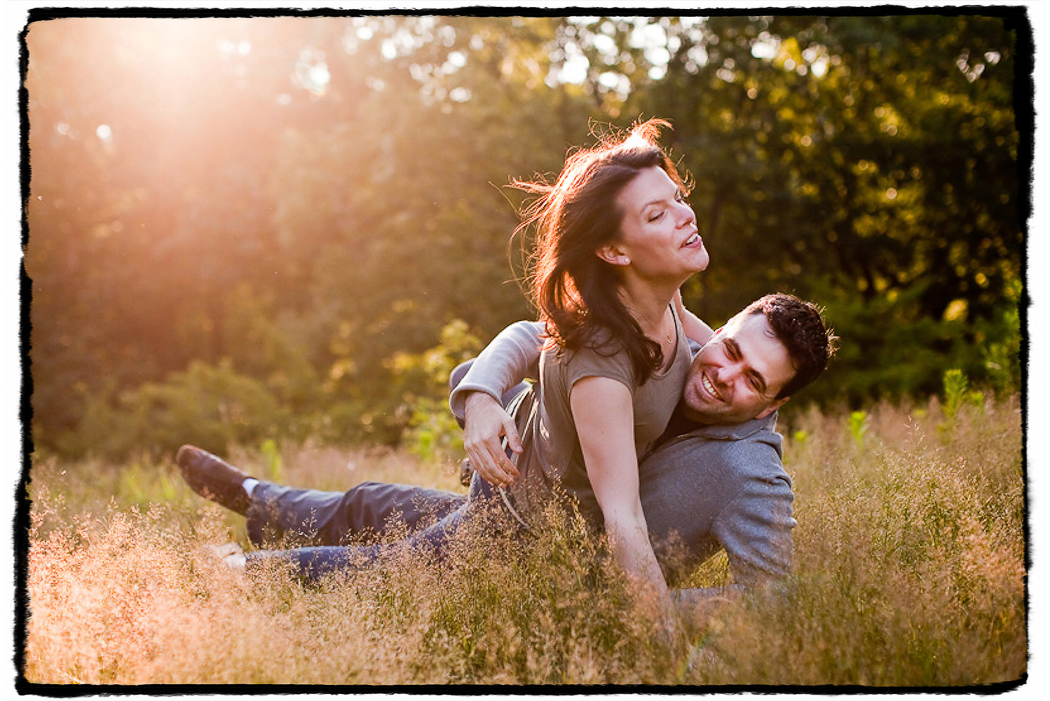 Engagement Portrait: Luke and Anna enjoyed some tussling in the grass in early spring in Central Park.