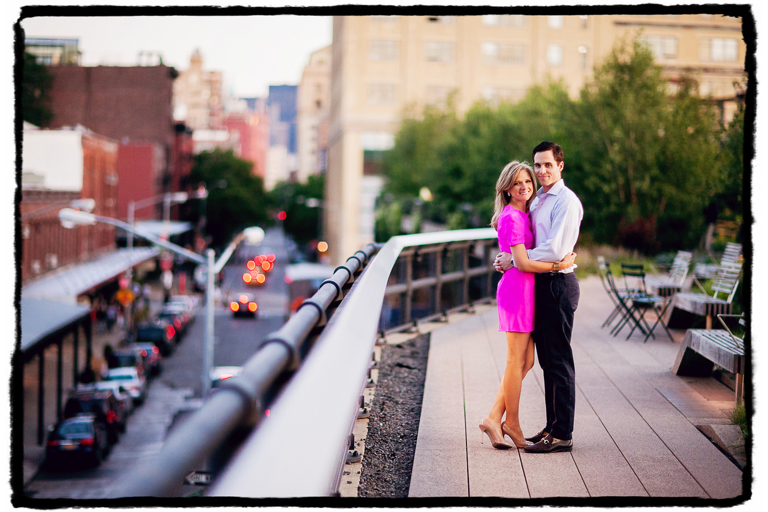 Engagement Portrait: Devin & Mike pose for an extra special photograph up on the High Line.  You can see their building in the distance behind them!