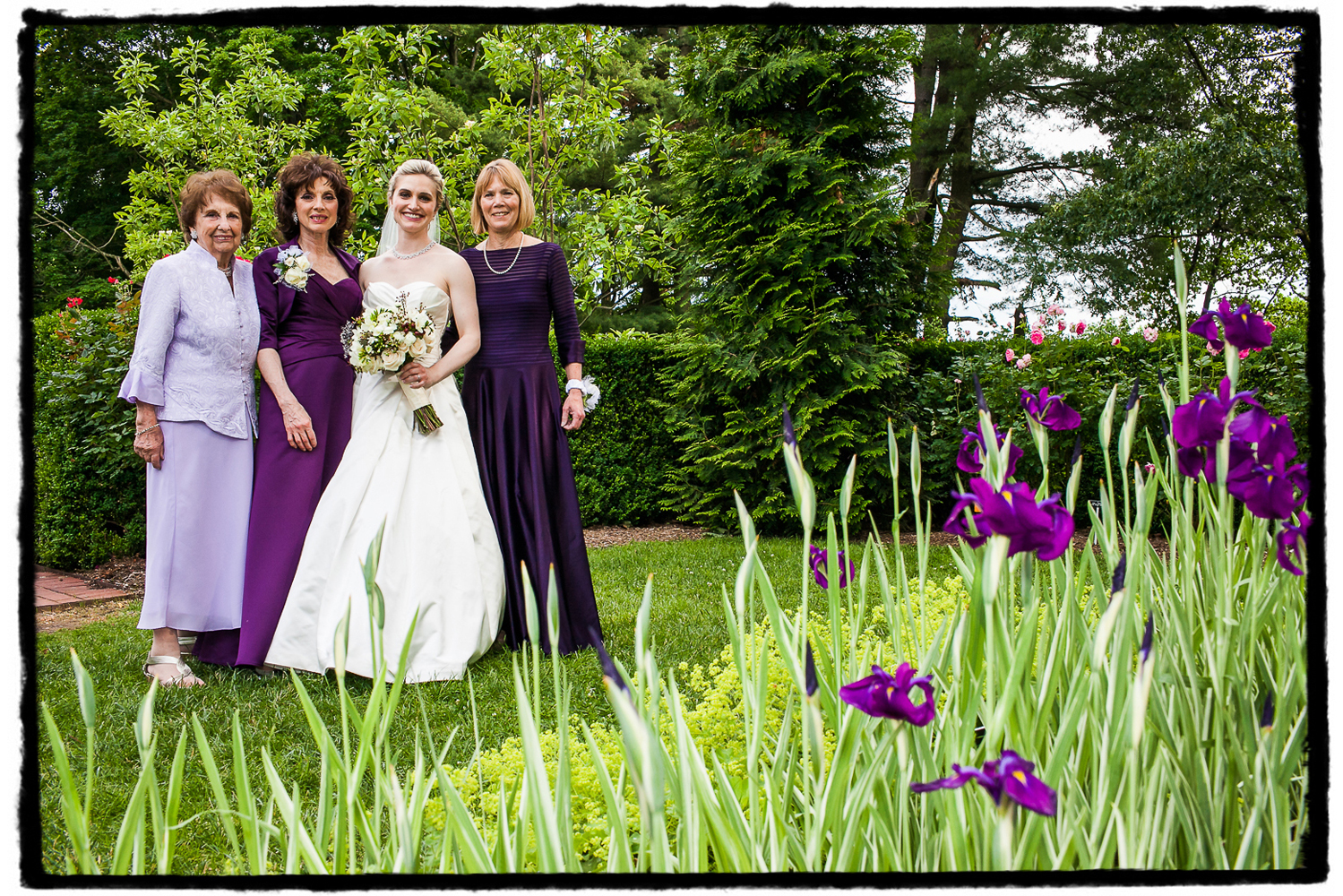 The irises at Frelinghuysen Arboretum were a perfect complement to the dresses worn by this bride's mother, aunt, and grandmother.