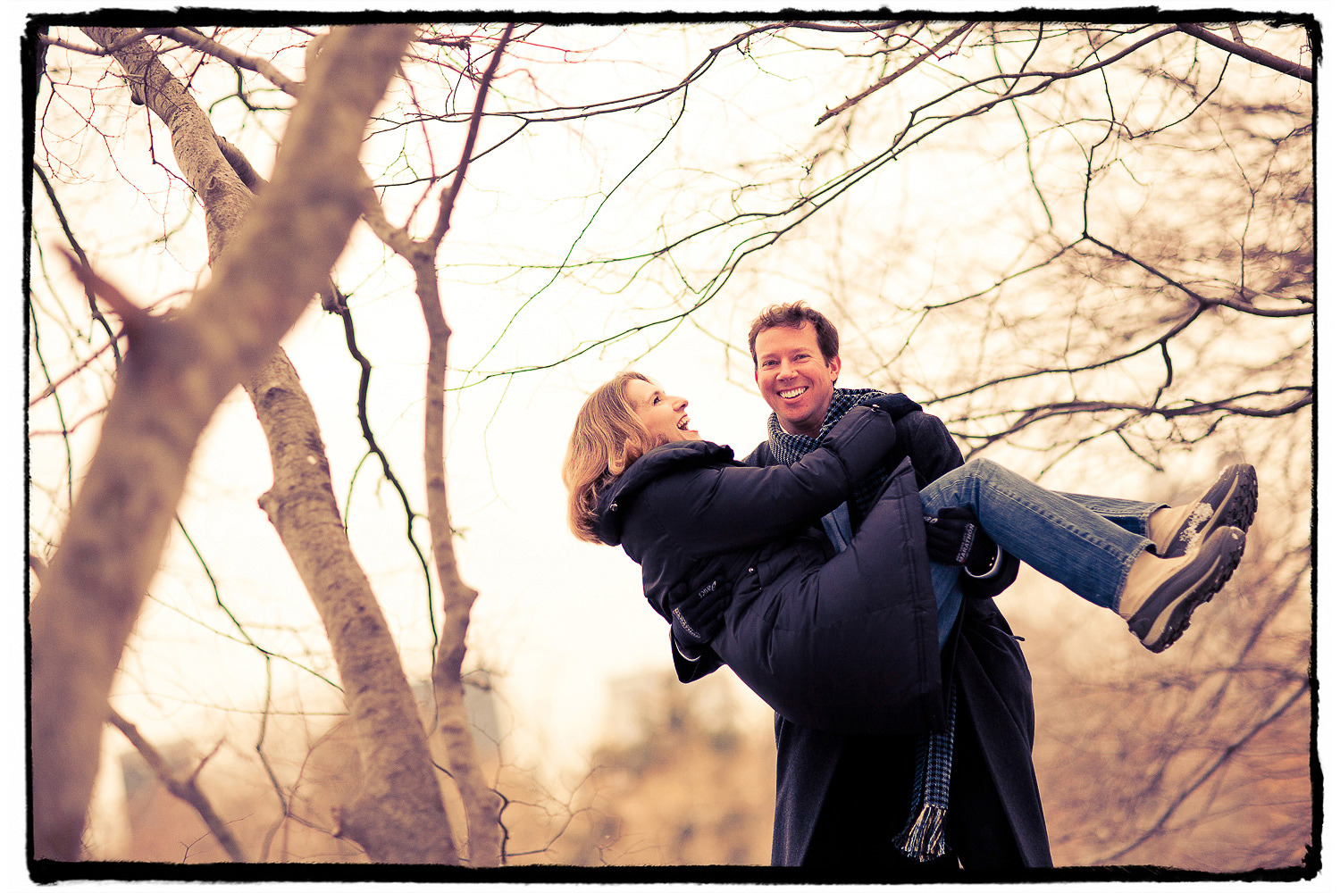 Engagement Portrait: Doug practices his threshold carrying in Central Park mid-winter.
