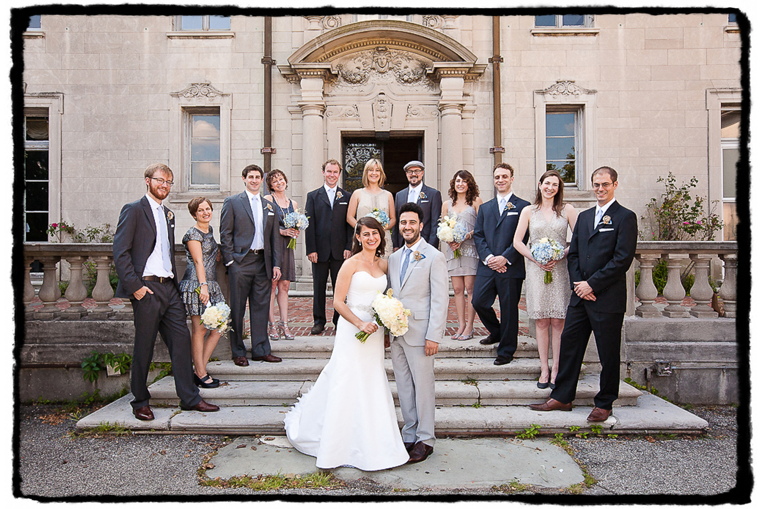 Tracey & Ben and their bridesmaids and groomsmen on the front stairs outside of Alder Manor in Westchester NY.