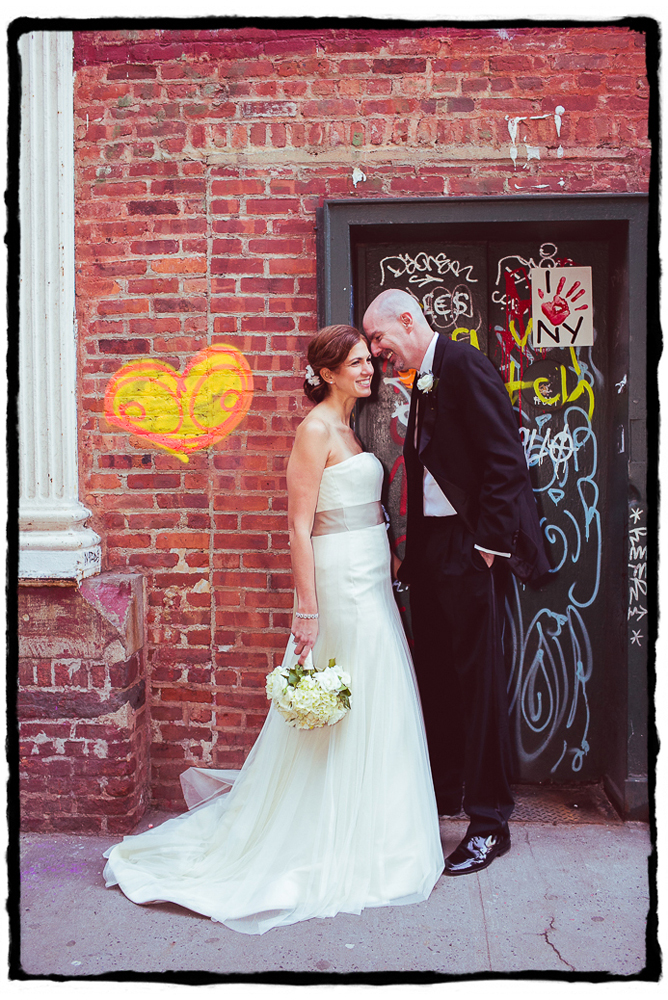 It brings me so much joy to find street art that can complement a couple's portrait-- this grafitti heart was perfect for a portrait in front of this SoHo doorway.