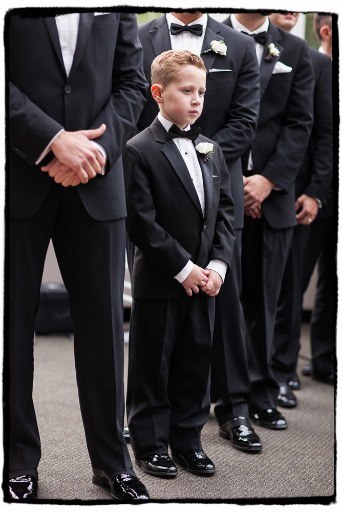 This ring bearer takes his role seriously at The Palm House, Brooklyn Botanic Garden.