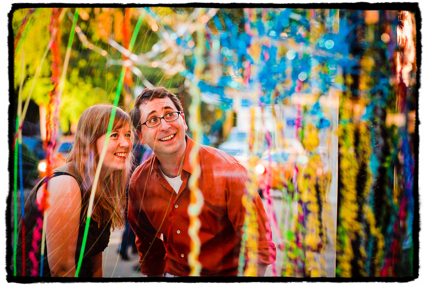 Engagement Portraits: Katie & Jason check out the art installation in the Flatiron Building.