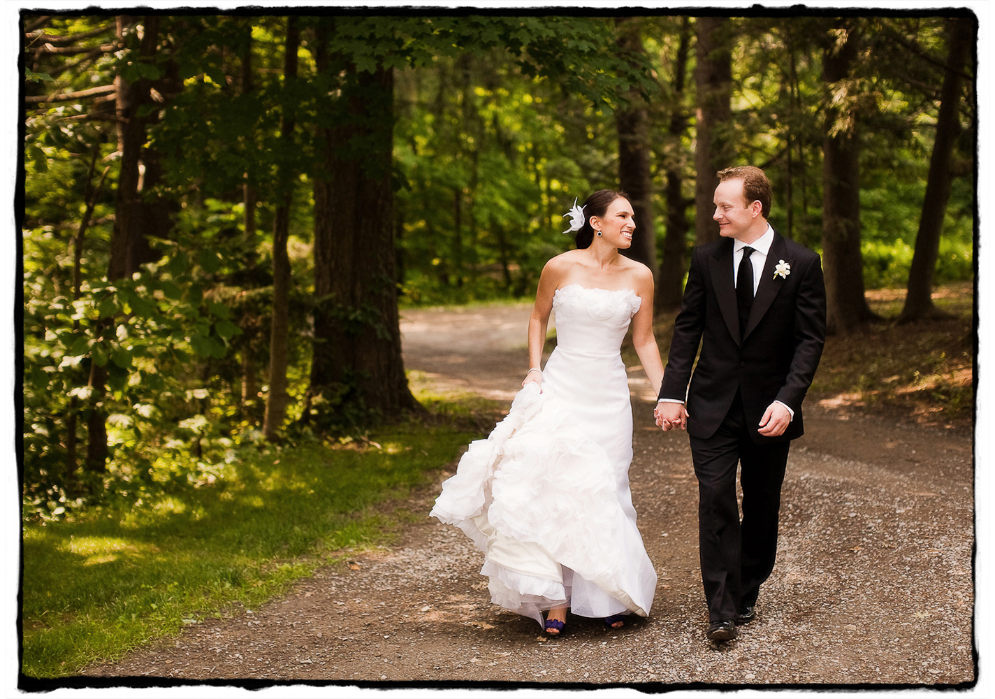 The grounds at Buttermilk Falls Inn are an incredible spot for a romantic stroll.  I loved how Michele's dress flounced as she walked with her husband-to-be.
