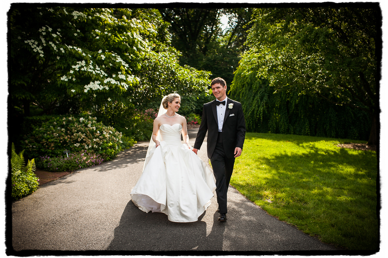 Sarah and Chris were picture perfect on their wedding day, shown here strolling through Freylinghuysen Arboretum.